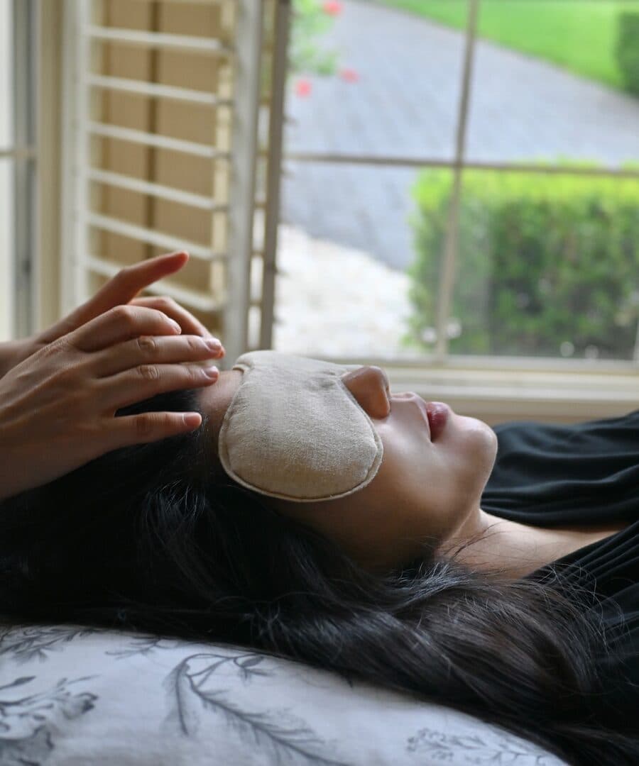 A therapist preparing for an in-home prenatal massage